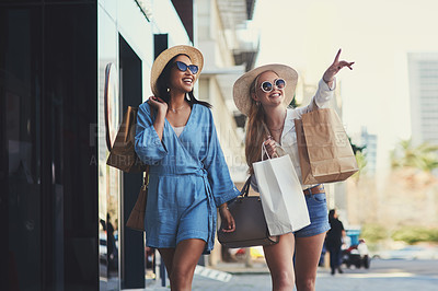 Buy stock photo Pointing, friends and happy women with shopping bags in city for fashion sunglasses, discount or luxury clothes. Black Friday, girls or gift outdoor at mall for retail, street promotion or sales deal