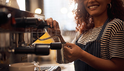 Buy stock photo Coffee machine, closeup and barista steam milk in cafeteria for latte, espresso and catering drinks. Hands, happy waitress and heating jug for hot beverage, caffeine process and restaurant industry