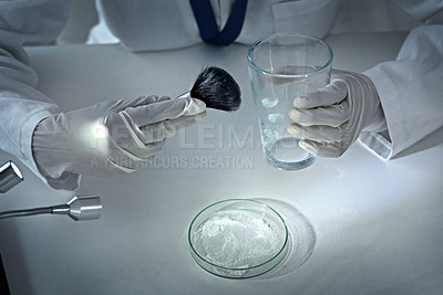Buy stock photo High angle shot of an unrecognizable female forensic scientist dusting for prints in the lab