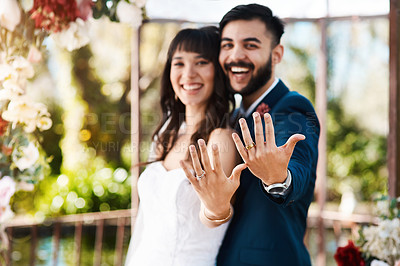 Buy stock photo Couple, love and wedding ring in outdoors, portrait and symbol for promise of loyalty or commitment. People, fingers and celebration for partnership, support and trust in marriage or relationship