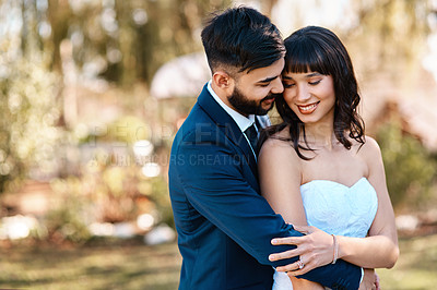 Buy stock photo Couple, love and hug on wedding day in nature, happy and commitment for marriage or relationship. People, embrace and smile in outdoor ceremony, partnership and celebration of forever or bonding