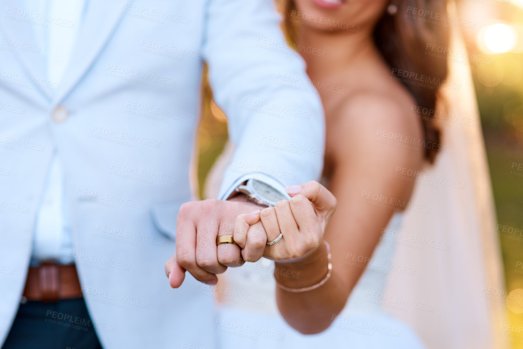 Buy stock photo Cropped shot of a newlywed couple showing off their wedding rings