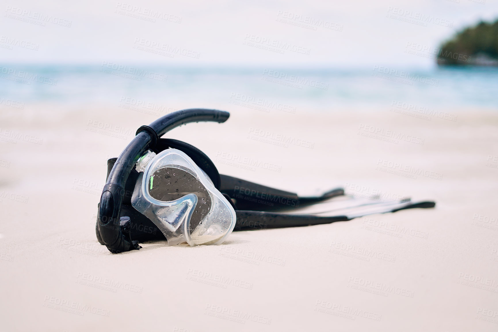 Buy stock photo Still life shot of snorkeling gear on a beach in Raja Ampat, Indonesia