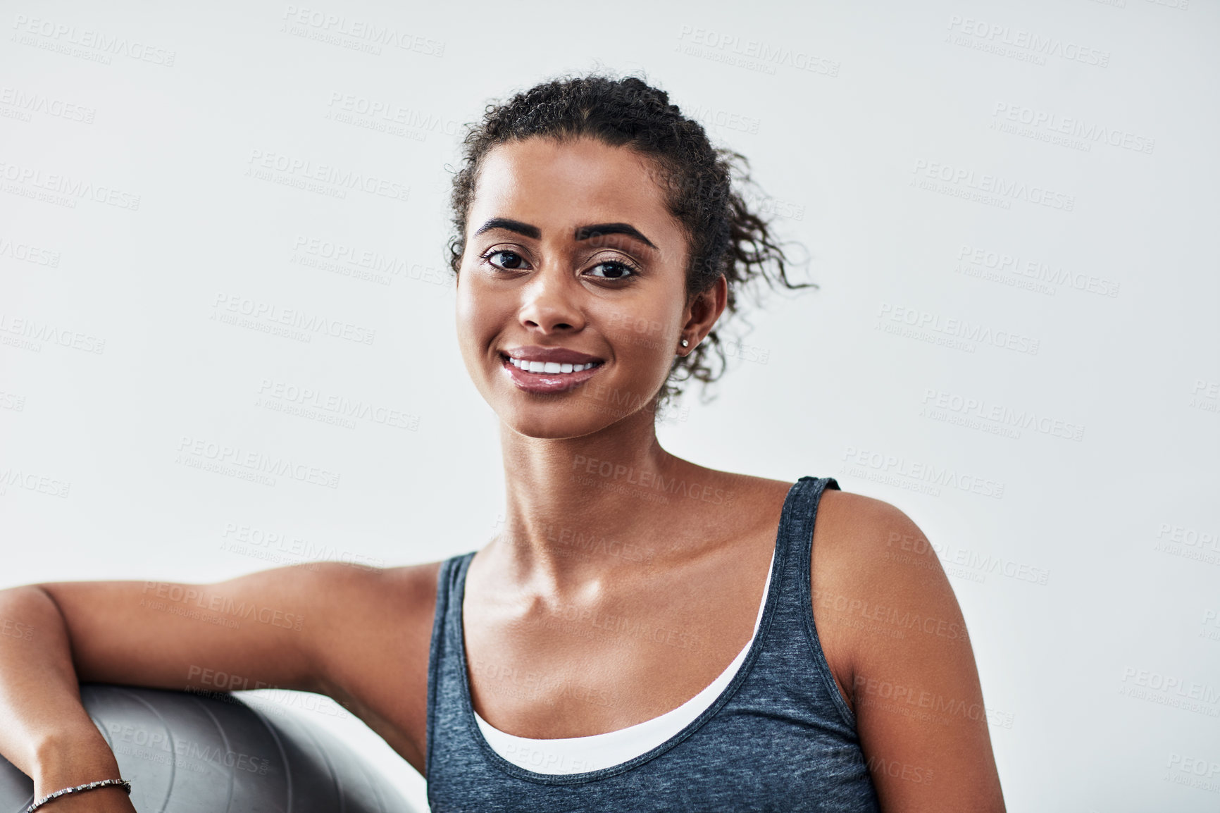 Buy stock photo Happy woman, portrait and fitness with exercise ball for workout, training or practice on a white studio background. Young, active or female person with smile for yoga, pilates or health and wellness