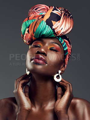 Buy stock photo Beauty, Cosmetic and woman with a turban in studio with a elegant, glam and makeup face. Classy, jewelry and young African female model with a head wrap doing sensual pose isolated by gray background