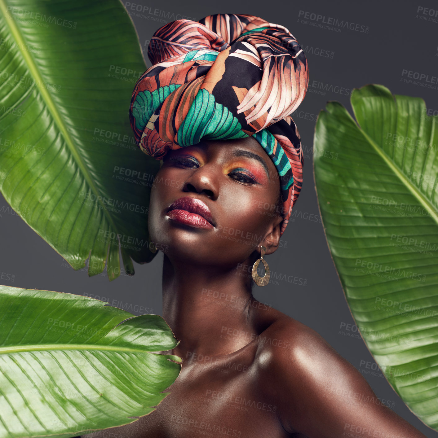 Buy stock photo Leaf, makeup and portrait of black woman in studio for glow or natural cosmetics on grey background. Culture, beauty and face of African lady model with plant for cosmetology and jungle aesthetic