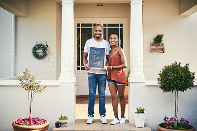 Buy stock photo Portrait of a young couple holding a chalkboard with 