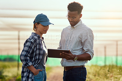 Buy stock photo Farmers with a tablet checking growth, monitoring farming progress and farm export orders on technology. Smiling gardener meeting with environmental scientist and analyzing data on agriculture estate