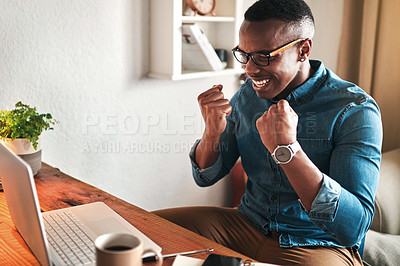 Buy stock photo Creative entrepreneur with a laptop celebrating, cheering and feeling excited after reading email with good news. Happy, smiling and successful freelancer working from home on technology for startup