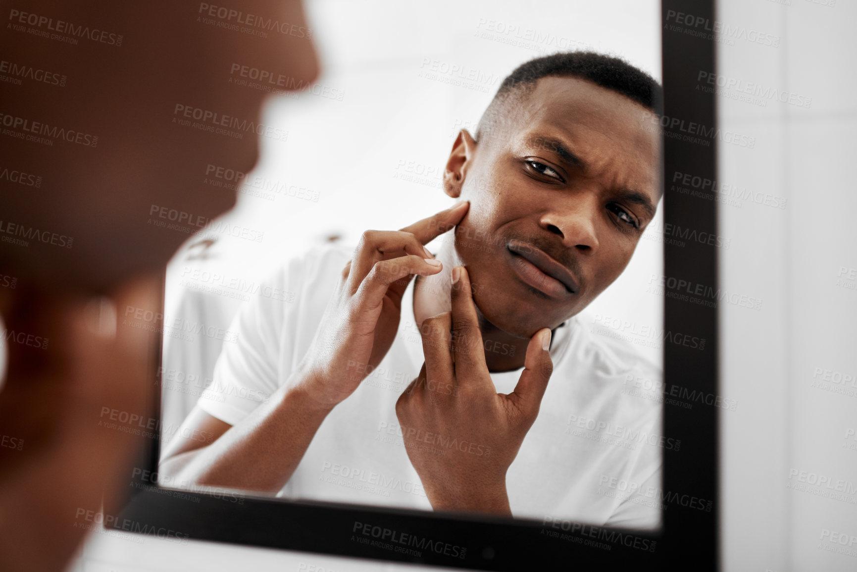 Buy stock photo Skincare, black man and thinking in bathroom with mirror, touch and acne control. Person, reflection and squeeze skin in home for maintenance, dermatology treatment and grooming in morning routine