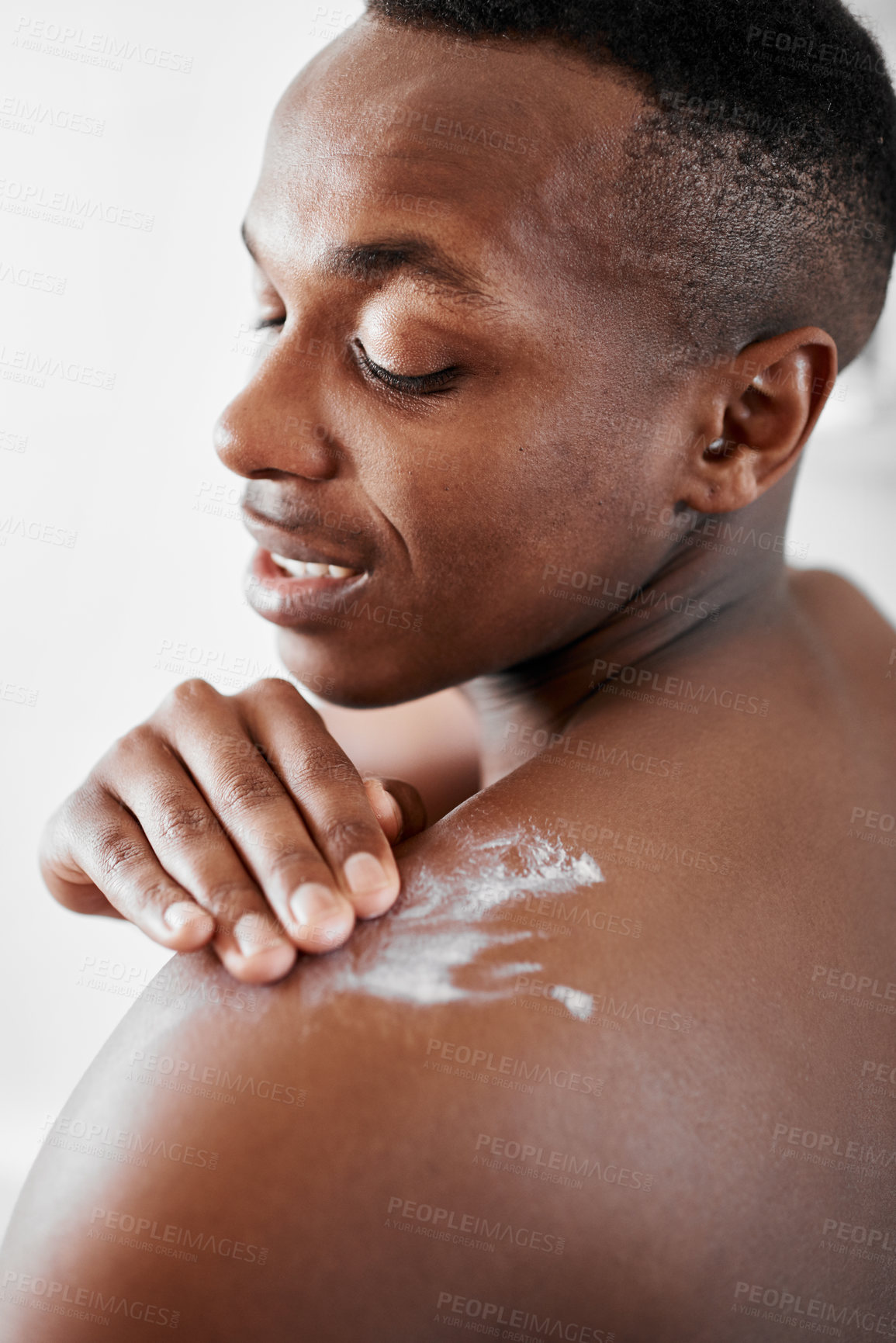 Buy stock photo Black man, cream and moisturizer in home with back, skincare and fresh fragrance with grooming. Male person, body and sunscreen in home for skin hydration, dermatology and lotion in morning routine