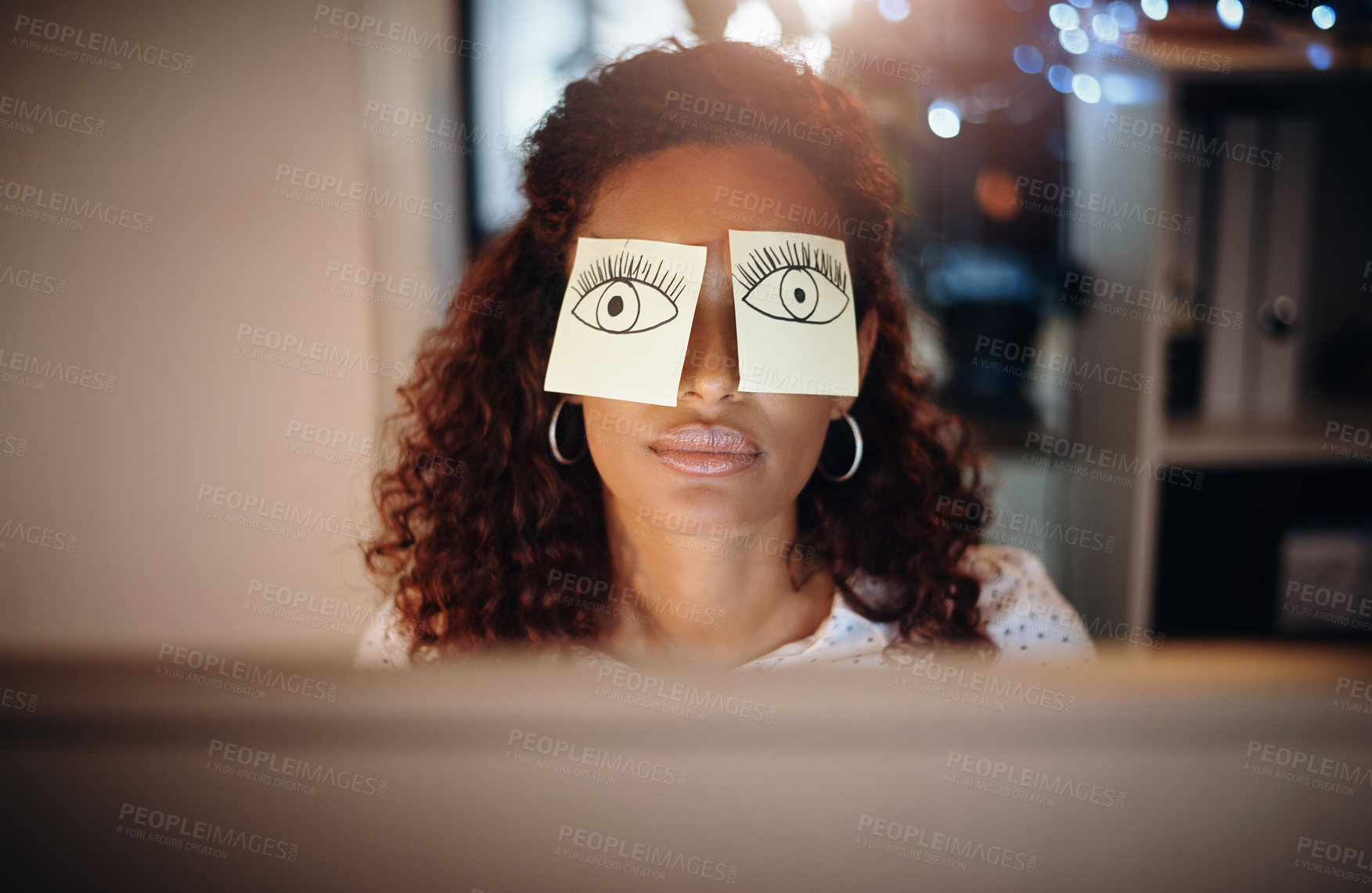 Buy stock photo Shot of a tired young businesswoman working late in an office with sticky notes covering her eyes