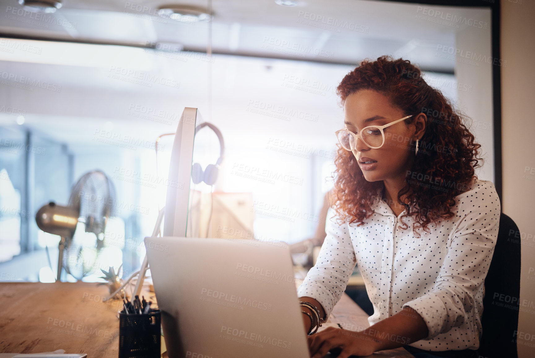 Buy stock photo Business woman, laptop and typing in workplace for strategy, planning schedule and thinking. Female content manager, seo expert or reading on web, app or social network communication with creativity