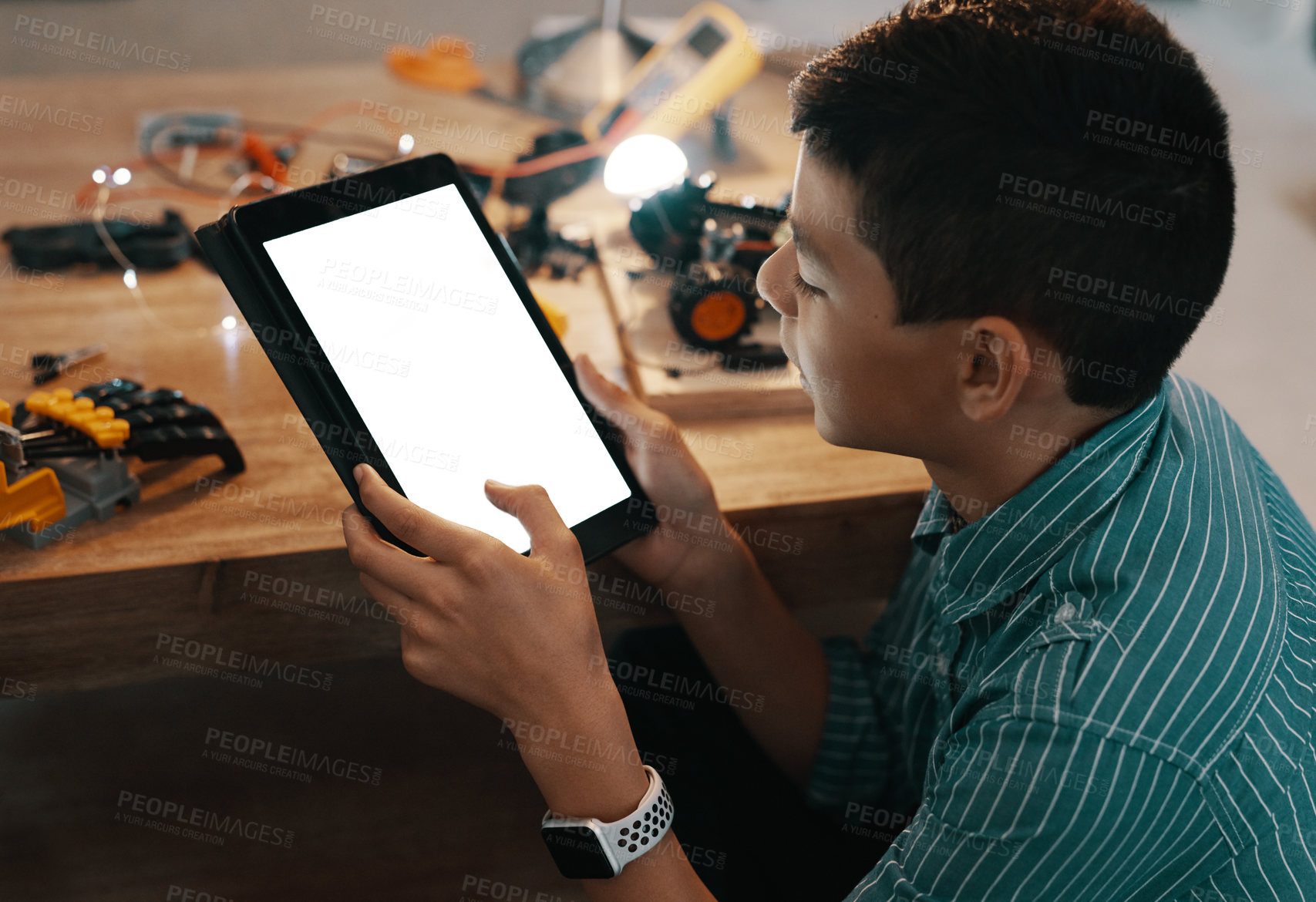 Buy stock photo Boy, robotics and engineering with tablet screen for research, design or steps on desk at home. Child, kid or junior technician on technology for online tutorial, guide or school project on mockup