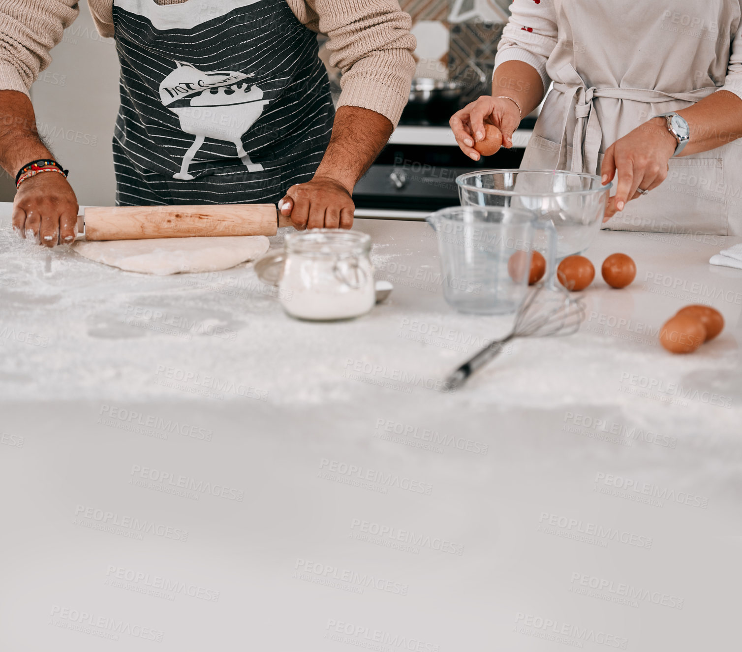 Buy stock photo Home, kitchen and hands of couple with dough for meal prep, support or rolling in flour on table. Eggs, roller and people with pastry ingredients in house for healthy diet, dinner or help in marriage