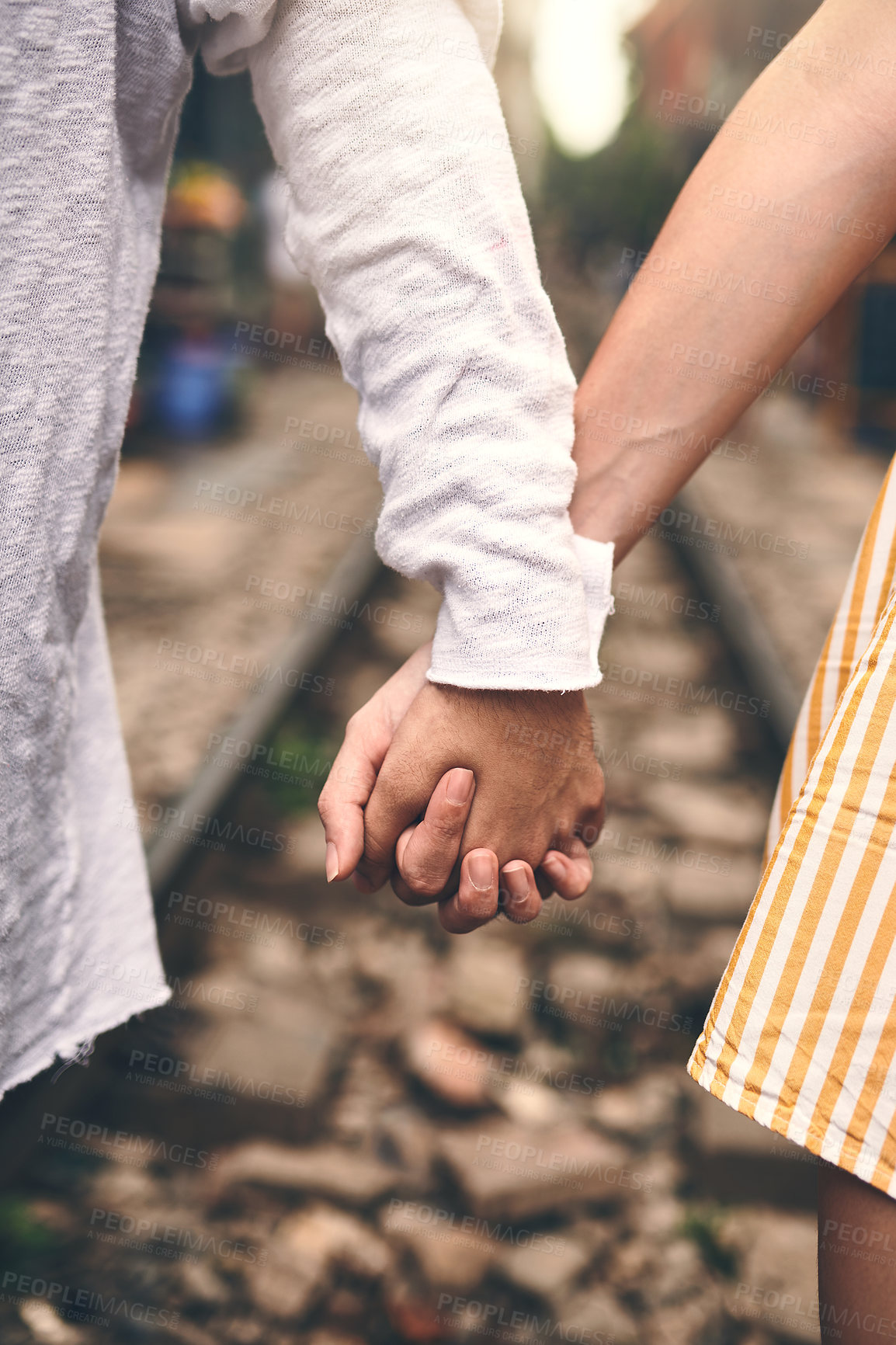 Buy stock photo Holding hands, care and couple with unity outdoor for romantic date together on vacation. Love, travel and closeup of man and woman with connection on honeymoon trip for marriage bonding together.