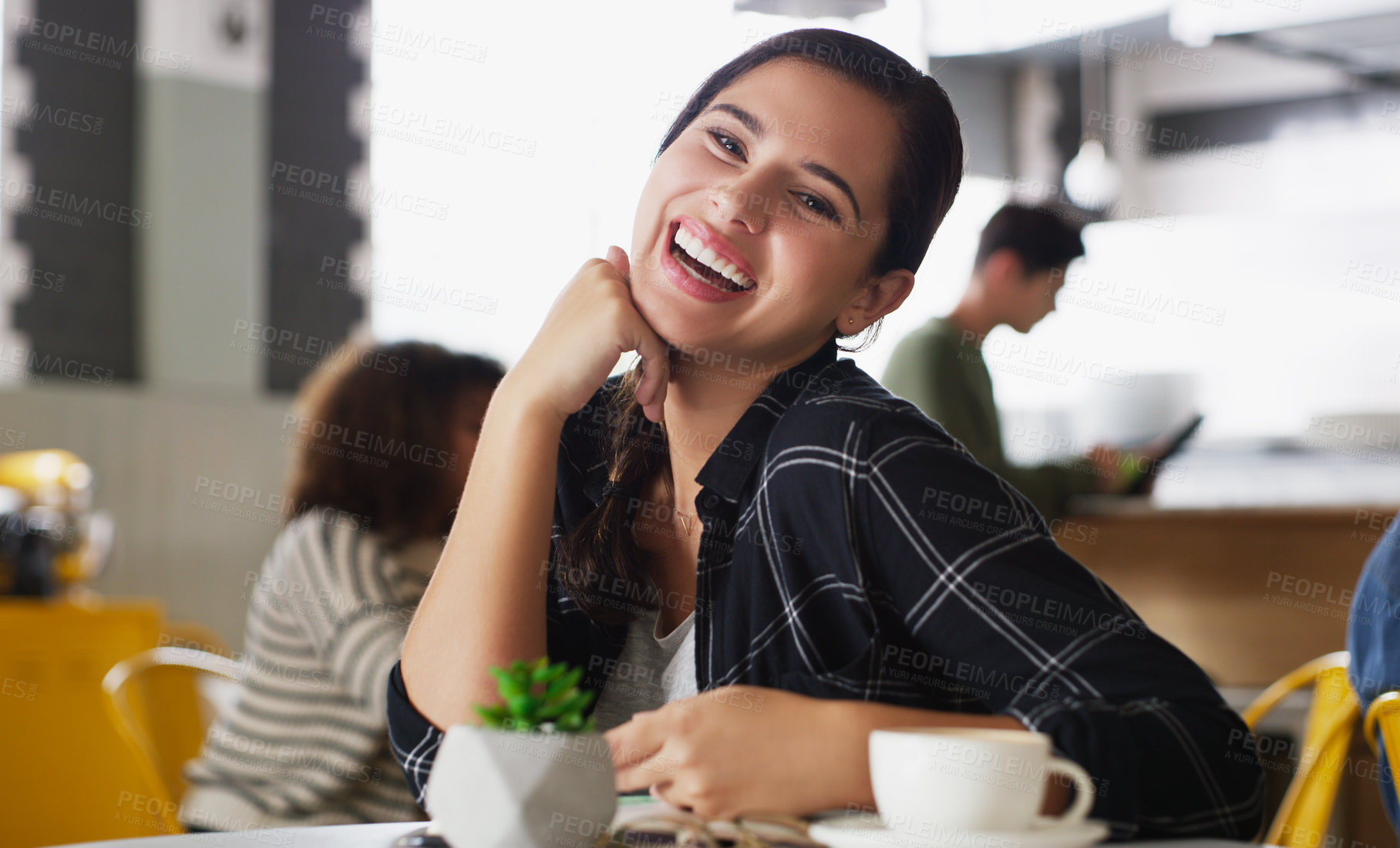 Buy stock photo Portrait of an attractive young woman sitting in a cafe