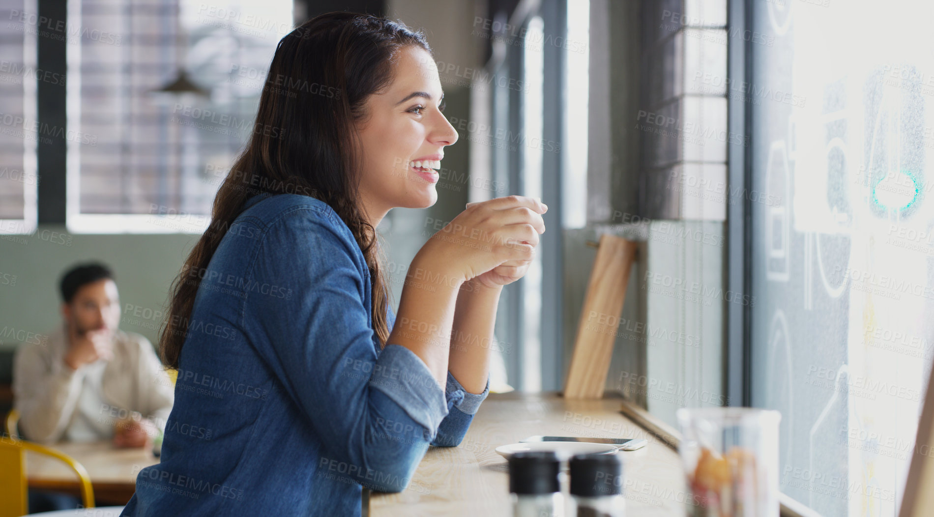 Buy stock photo Shot of an attractive young woman drinking coffee in a cafe