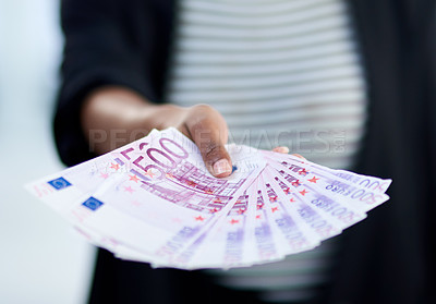 Buy stock photo Euro, hand and businesswoman with cash for bribe in office, workplace or place of work. Finance, currency and female person offering bills for money laundering, fraud corruption or illegal payment