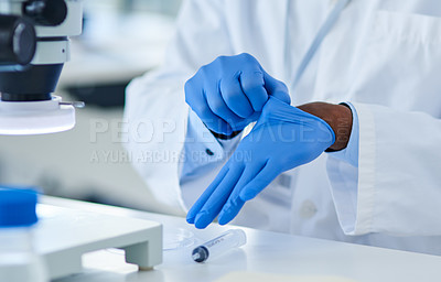 Buy stock photo Gloves, hand and research in lab, scientist and medicine of periodic table, innovation and future for health. Workplace, closeup and science of discovery, career and job as pharmaceutical and expert