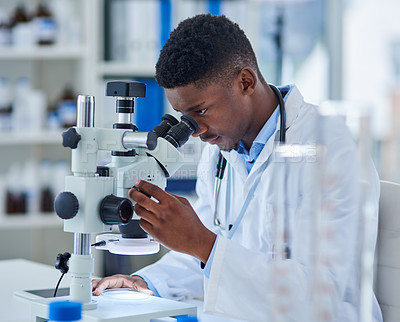 Buy stock photo Science, research and black man with microscope for biotech, investigation or medical engineering in laboratory. Analysis, lab technician or scientist checking vaccine sample for pharmaceutical test.