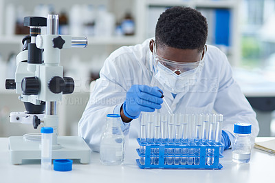 Buy stock photo Science, test tubes and black man in laboratory, research and experiment with medical equipment. African person, employee and scientist with healthcare and education for forensics and investigation