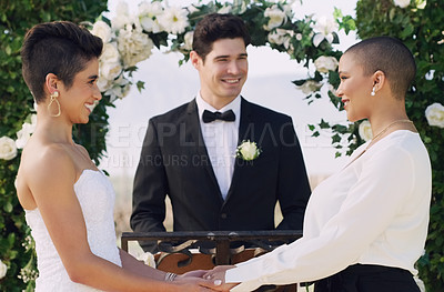 Buy stock photo Love, holding hands and lgbtq with lesbian couple at wedding for celebration, gay and pride. Smile, spring and happiness with women at marriage event for partner commitment, bride and freedom