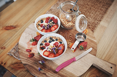 Buy stock photo Healthy breakfast, cereal and muesli diet above on table of fruit, wheat or oats for organic food or wellness at home. Bowls in brunch ready for dieting plan, nutrition or fibre meal on counter top