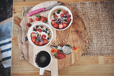 Buy stock photo Healthy breakfast, cereal and diet above on table of fruit, wheat or oats for organic food, wellness or fiber nutrition at home. Bowls for brunch with cup of coffee for dieting plan on counter top