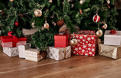 Buy stock photo Christmas, floor and box of gift by tree for celebration, festive season and party. Xmas, surprise and gratitude with present on ground of living room with nobody for wow, announcement and holiday 
