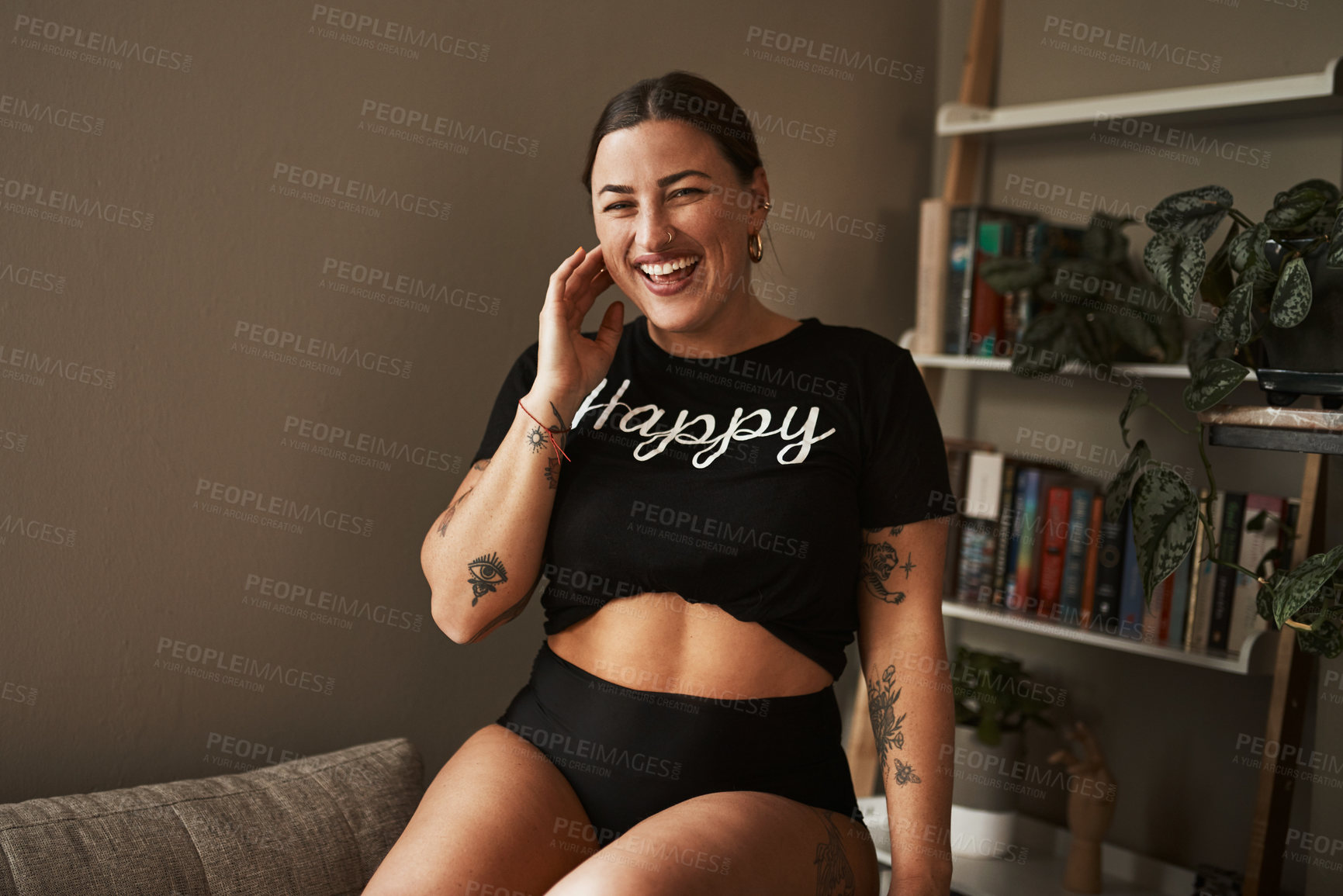 Buy stock photo Home, portrait and woman with underwear on couch, relax and comfortable with confidence in living room. House, female person and pride with smile for body positivity, creative tattoos and happiness