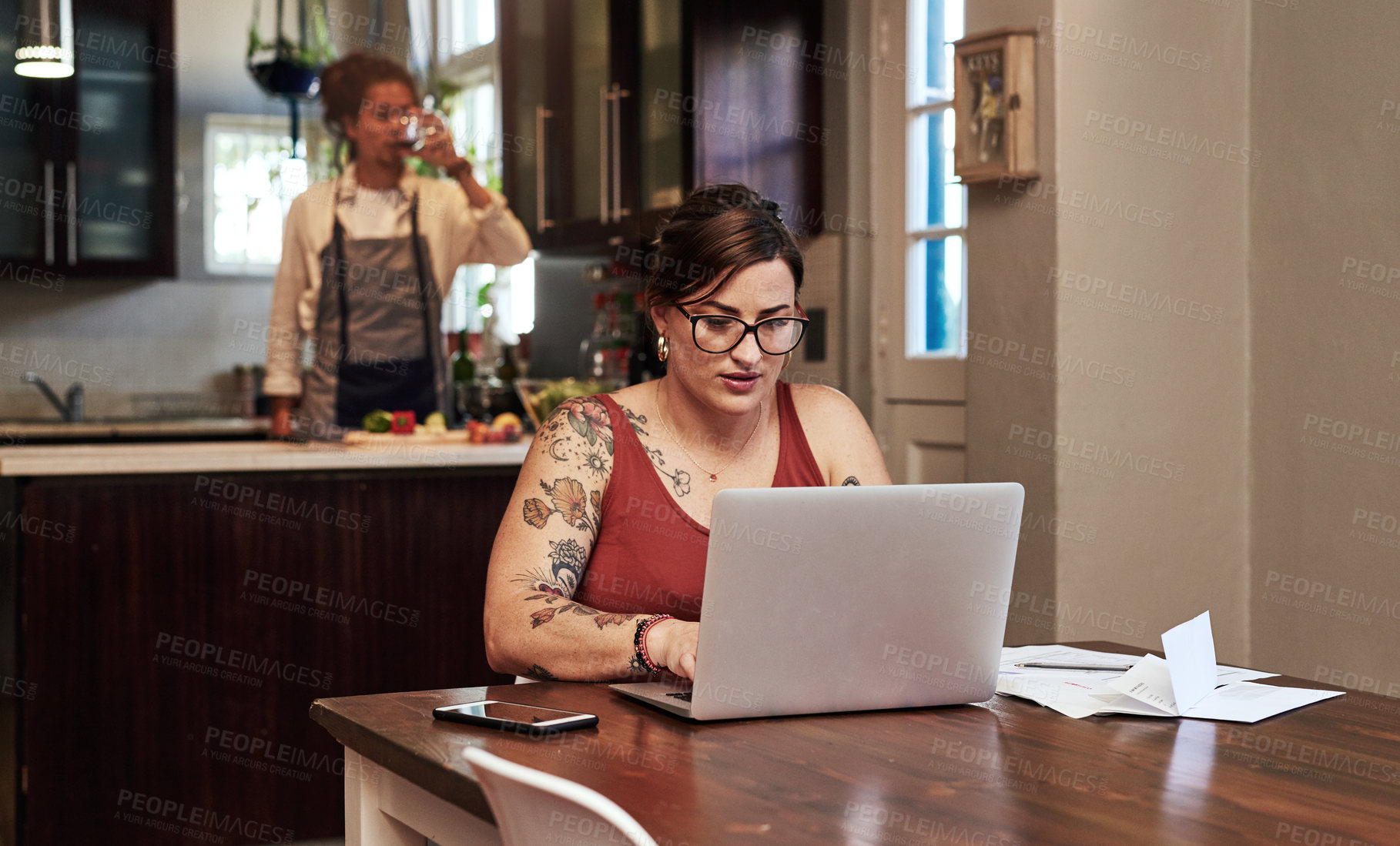 Buy stock photo Woman, home and typing with bills by laptop for debt management, receipts and invoices for mortgage or rent payments. Girl, internet and read or review tax document, investment accounts and statement