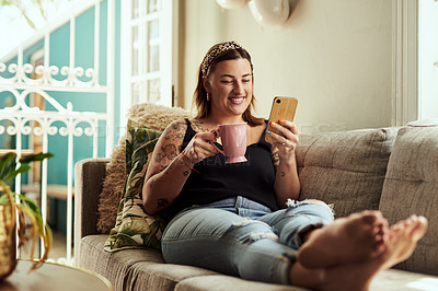 Buy stock photo Coffee, smile and woman on sofa, smartphone and internet with social media, texting and connection. House, herbal tea and girl on couch, cellphone and typing with message to contact and communication