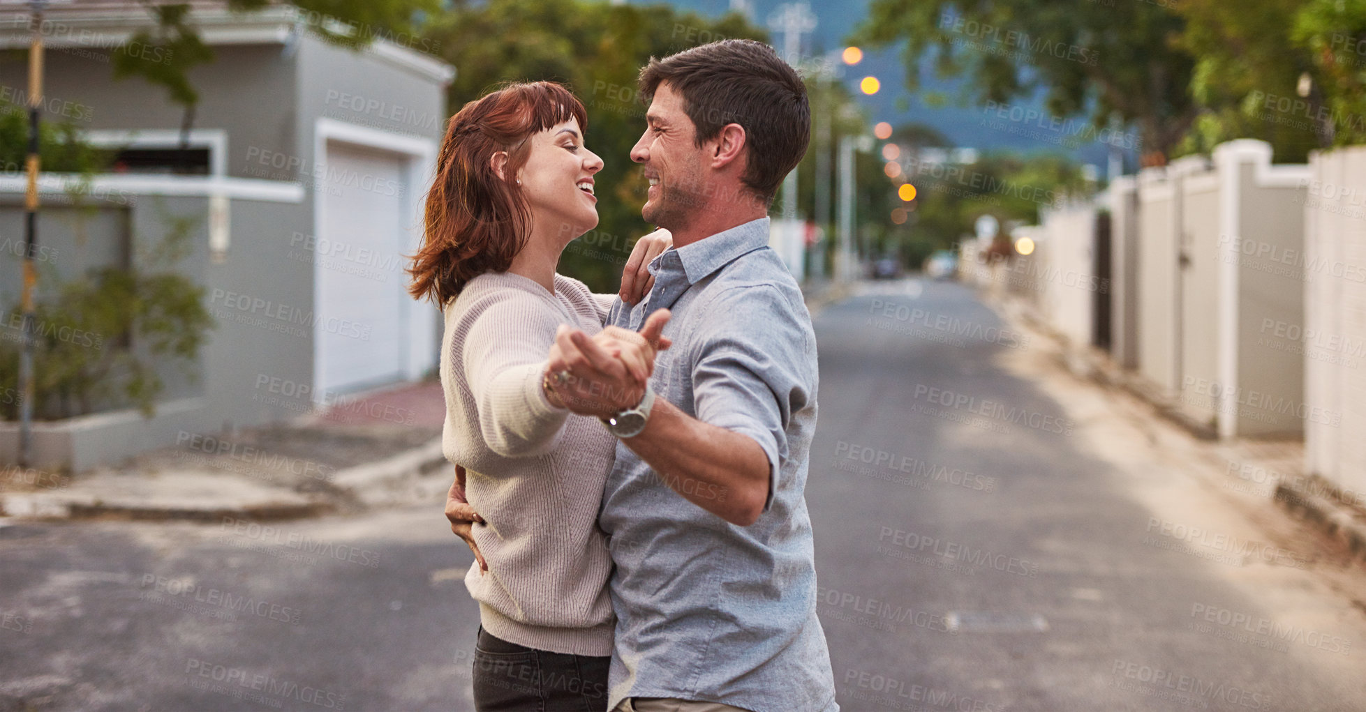 Buy stock photo Dance, street and a happy couple having fun together outdoor while bonding in their domestic neighborhood. Love, road or residential with a man and woman bonding while dancing outside for freedom