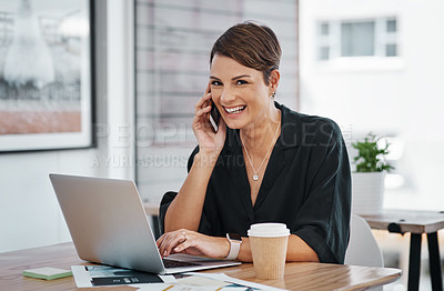 Buy stock photo Cropped portrait of an attractive young businesswoman sitting alone and talking on her cellphone in the office