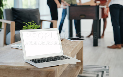 Buy stock photo Cropped shot of a website page displayed on an office computer while businesspeople work in the background
