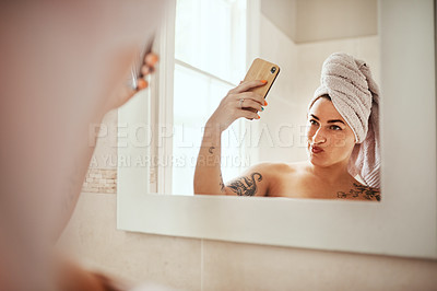 Buy stock photo Woman, phone and bathroom with picture for social media and vlogging beauty routine in home. Mobile, skincare and digital vlog with morning, cleaning and body grooming with technology and mirror