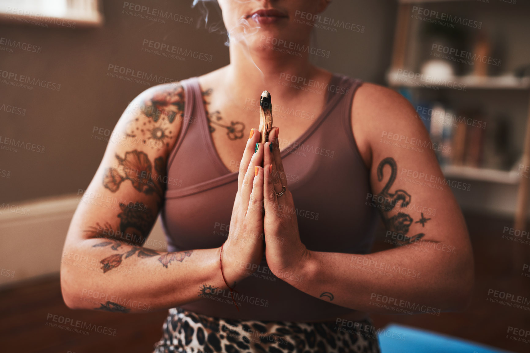 Buy stock photo Closeup shot of a woman meditating at home