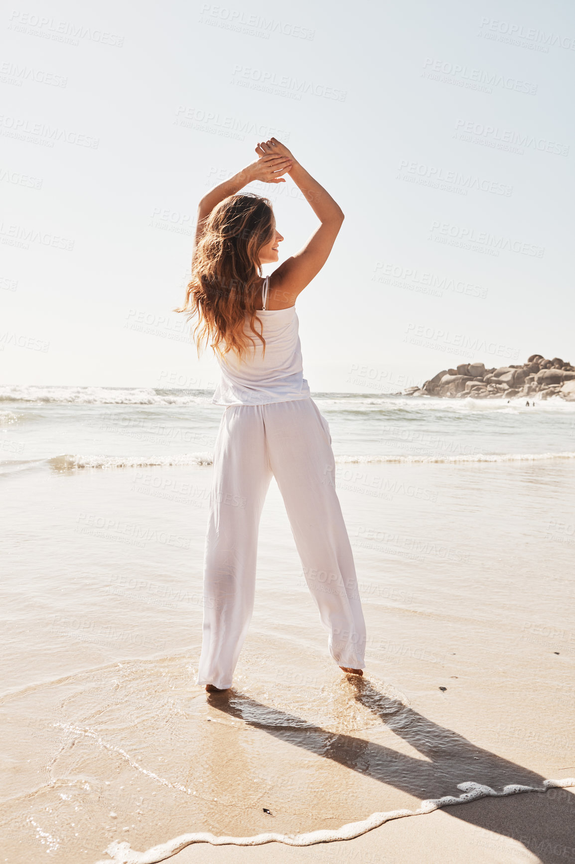 Buy stock photo Smile, dance and travel with woman at beach for summer vacation, freedom and ocean getaway. Happiness, seaside trip and energy with person outdoor for holiday, weekend break and tropical island