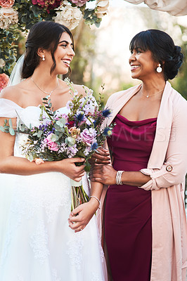Buy stock photo Bride, mother and wedding day with happiness and family bonding at celebration marriage. Happy, smile and mom with daughter together at love and commitment event outdoor with flower bouquet and mama
