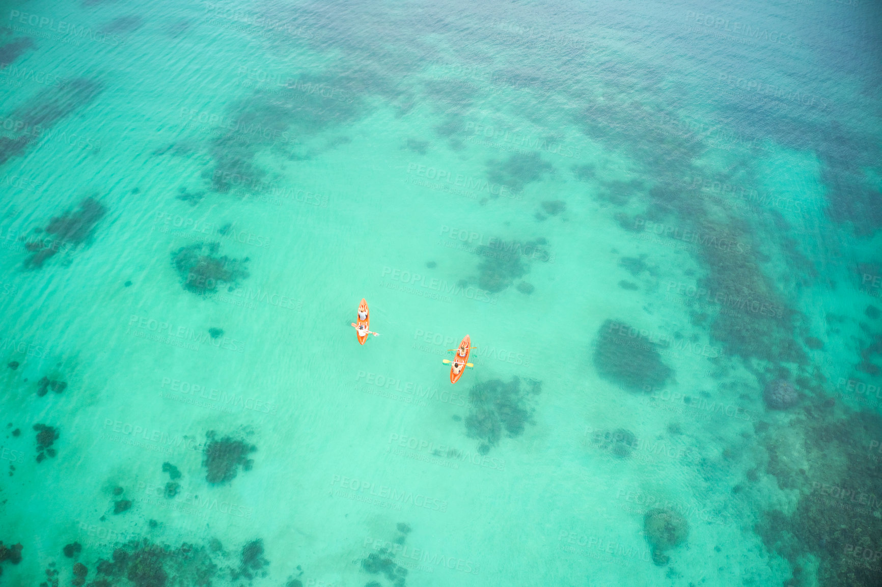 Buy stock photo Aerial boat and people in ocean for kayak adventure, travel or journey at sea together in the outdoors. Couple traveling, kayaking or rowing on big calm, peaceful or serene beach water in nature