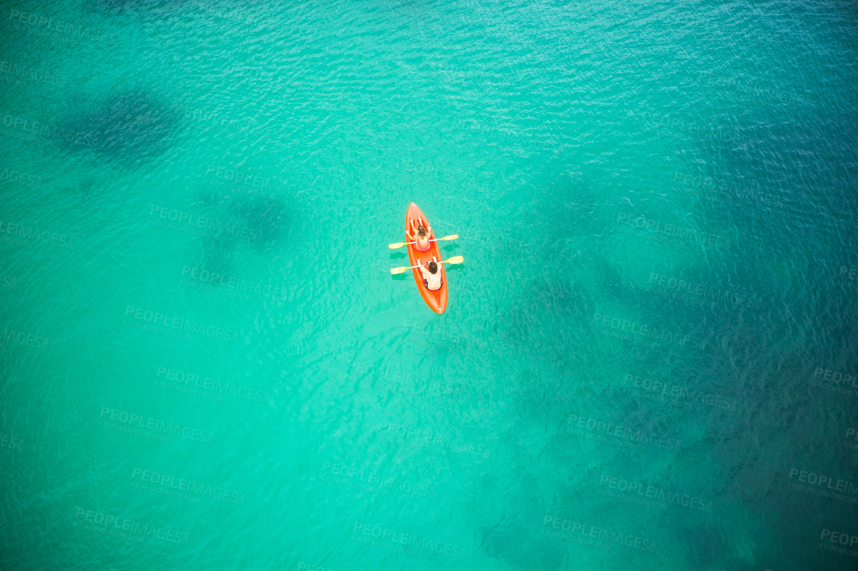 Buy stock photo Top view, boat and people in blue ocean together for kayak adventure, travel or journey at sea on mockup. Couple trailing or rowing on big calm, peaceful or serene beach water in nature for kayaking
