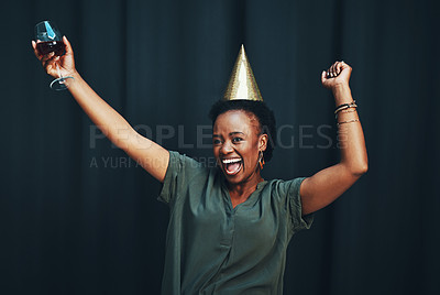 Buy stock photo Woman, celebrate and happy birthday party portrait or dance with party hat for new years. Winner triumph, event success and african woman happiness celebration with drink, dancing fun and laughing