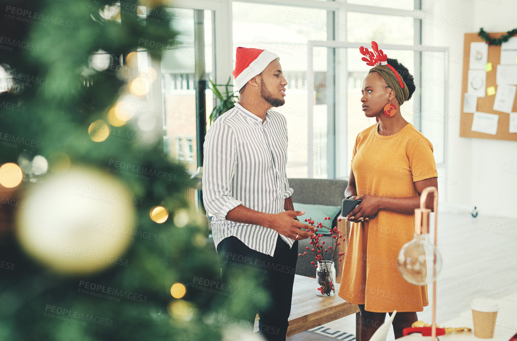 Buy stock photo Business people, christmas and office party with a team talking, conversation and discussion about holiday celebration. Black man and woman together in workplace for brainstorming and collaboration