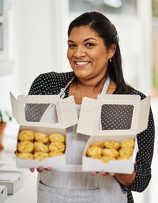 Buy stock photo Shot of a woman showing off her freshly baked goods