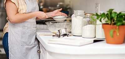 Buy stock photo Woman, kitchen and sifting for flour, home and glass bowl for dessert or small business. Baker, ingredients and mixing with spatula, house or startup bakery for recipe prepare and sweet food process