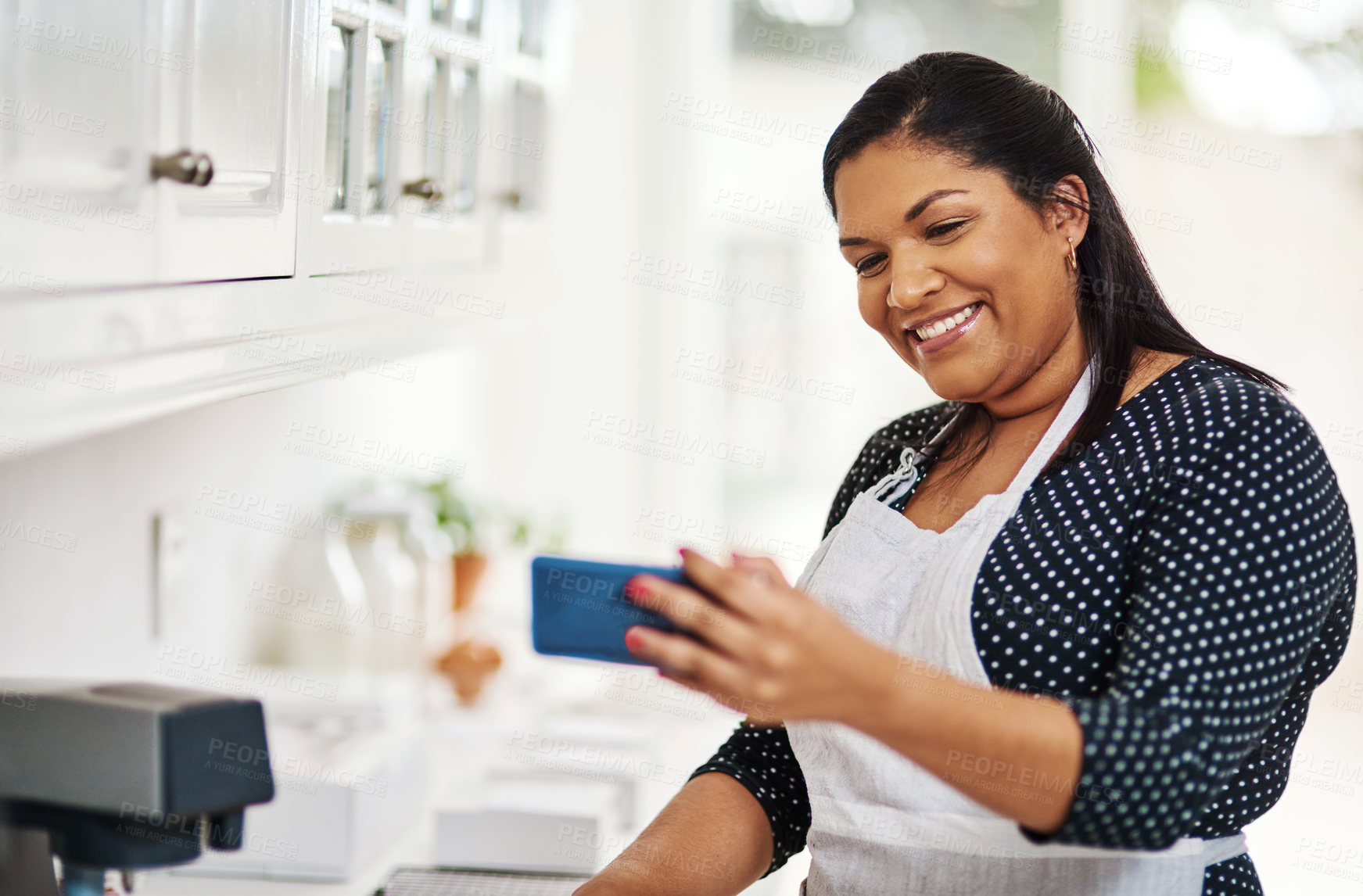 Buy stock photo Woman, chef and selfie in kitchen while cooking as influencer live streaming, content creator or recipe. Female person, smartphone and broadcast as baker in home for virtual class, digital or blog