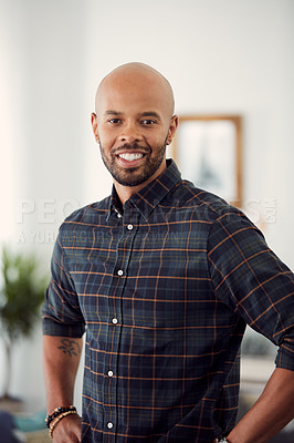 Buy stock photo Cropped shot of a handsome young man at home