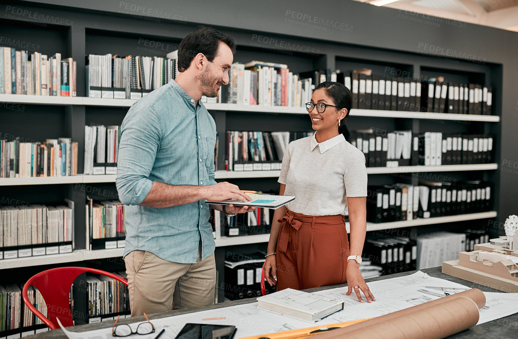 Buy stock photo Tablet, blueprint and team of architects in office on site planning for building development project. Discussion, layout and industry designers working with digital technology at architecture agency.