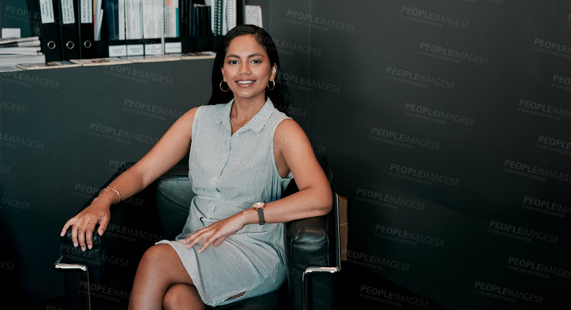 Buy stock photo Cropped shot of a young businesswoman sitting in an office